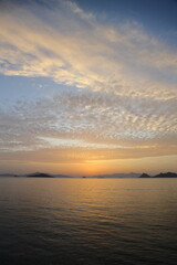 Fototapeta premium sunset on the beach. Seaside town of Turgutreis and spectacular sunsets. Selective Focus.