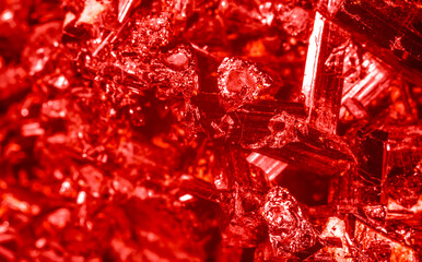 Amethyst red crystals. Gems. Mineral crystals in the natural environment. Texture of precious and semiprecious stones. Seamless background with copy space colored shiny surface of precious stones.