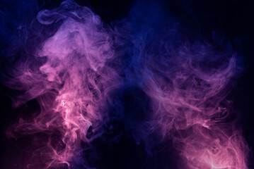 Fototapeta na wymiar Blue and pink steam on a black background.