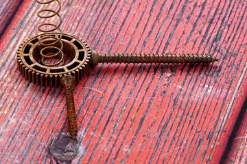 old rusty repair tools on a wooden background. Industrial objects