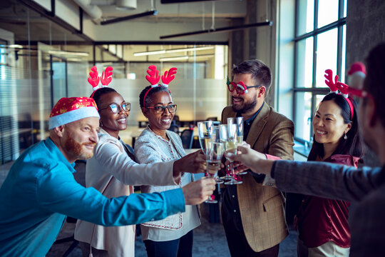 Colleagues celebrate festive season in a cheerful office gathering