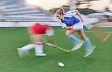 Obraz premium Hockey, women and sports speed on field for athlete team playing in competition tournament. Fitness, ground and workout of girl sport people playing outdoor stadium game with motion blur.