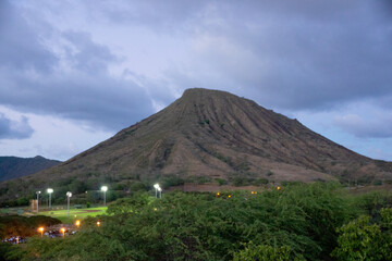 Fototapeta premium Koko Head Crater with stair trail up side visible at dusk