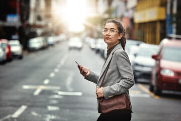 Phone, portrait of woman and cross street for journey, sunset commute and social media on internet....
