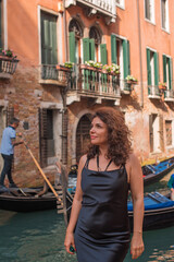 Fototapeta na wymiar Latina woman on vacation in Venice city in Italy. Holidays and vacation concept