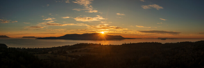 Aerial view of a beautiful sunset over Orcas Island in the Salish Sea area of the San Juan Island...