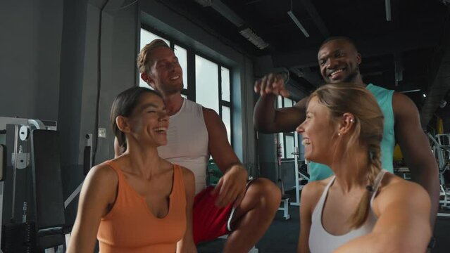 Athletes give high fives after finishing intense workout