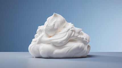 Obraz premium a pile of whipped cream sitting on top of a blue counter top next to a bottle of cream on top of a table. generative ai