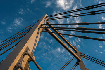 modern metal cable bridge imeni Kaczorowskiego on blue sky background, Lublin - obrazy, fototapety, plakaty