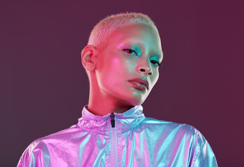 Futuristic fashion, cyberpunk portrait and black woman with chrome clothing in studio. Vaporwave,...