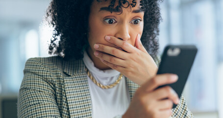 Business woman, reading phone and shocked for social media post, news or marketing error in office. Young african employee confused, surprise and stress on mobile for scam, mistake or wrong email