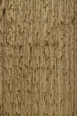 A captivating image of weathered pine planks neatly aligned in rows, displaying various wood tones shaped by the elements - rain, sun, and wind. 