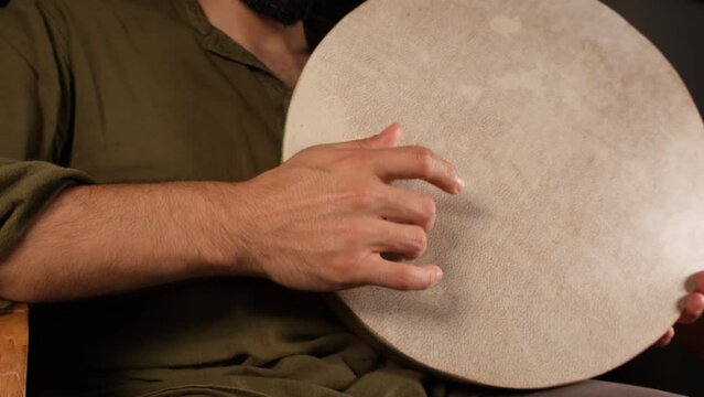 man playing daf