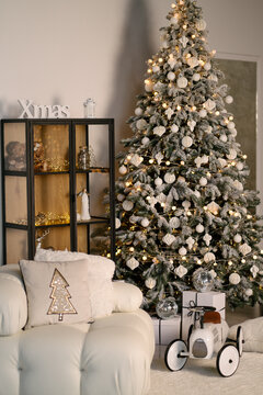new year cozy home interior with Christmas tree and garlands 