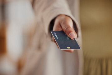 Businesswoman, giving or hand with credit card for finance or payment for shopping or capital investment. Retail closeup, offer or customer in commerce for banking or trade exchange for sales economy