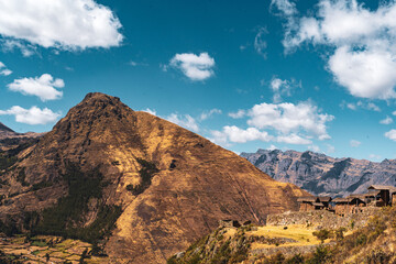 landscape of old inca ruins in the mountains in cusco