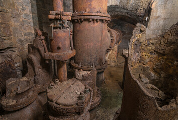 rusty pipes in a abandoned mining site