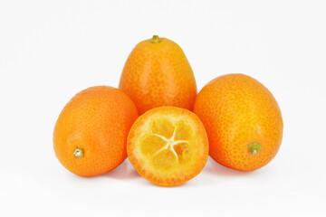 Fresh kumquat fruits, white background