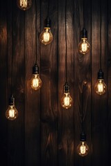 A collection of light bulbs hanging from a wooden wall. Perfect for adding a unique and industrial touch to any space.