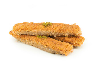 Turkish dessert kadayif isolated on white background, Shredded dough baked in syrup topped with crushed pistachios, Turkish delight