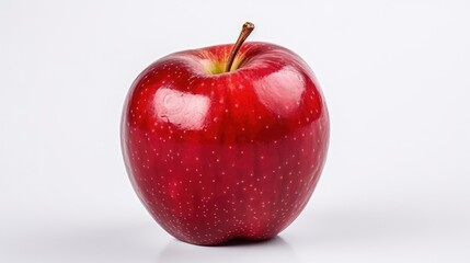 Ripe, juicy, red apple on a clean white background. A fresh, delicious snack full of nutrition. Organic and natural, it's sweet, crisp, and appetizing. A mouthwatering, succulent fruit.