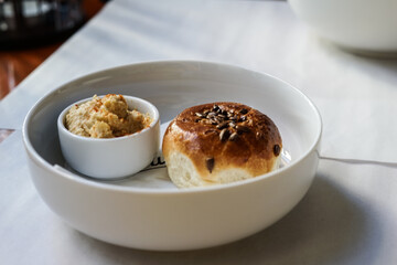 A breadroll and hummus