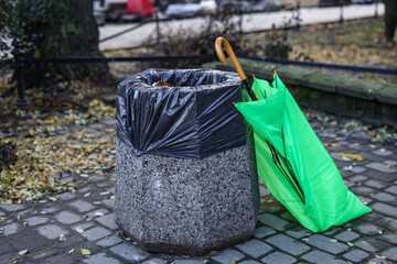 A broken umbrella in the street