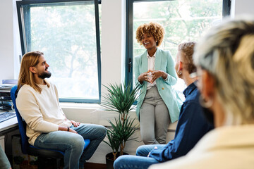 African woman talking during a relaxed meeting on a coworking