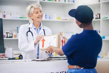 Foto op Plexiglas Pharmacist, package and delivery with woman in drug store for medical supplies with courier service. Healthcare professional, female employee and parcel with medicine in pharmacy for ecommerce. © Sharne/peopleimages.com