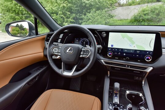 Lexus RX 450h+. A luxury car with a plug-in hybrid drive.  Cabin interior - dashboard. 05-11-2023, Prague, Czech Republic.