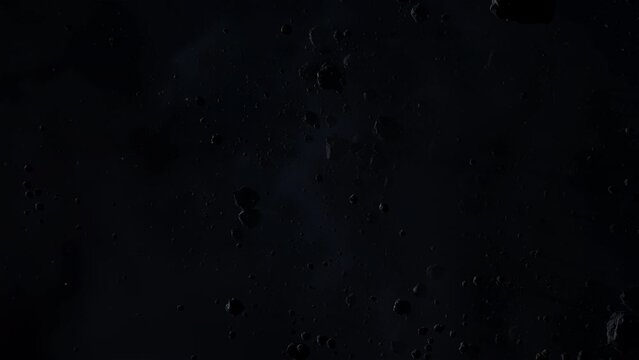 Asteroid belt field in dark outer space. 3D animation wide pan shot. Rock formations of cosmic debris and giant Meteorites. Celestial objects on starry stars background with dust nebula haze low light
