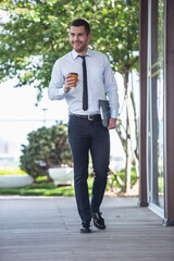 Businessman walking outdoors