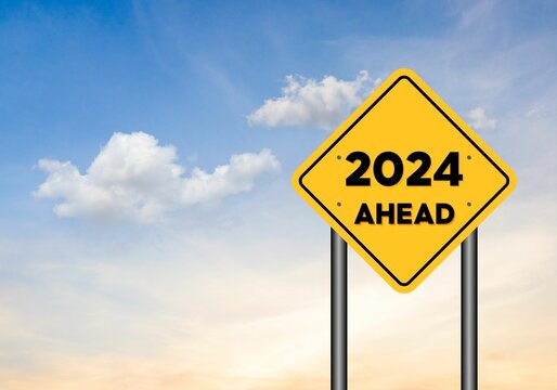 2024 Ahead Written Yellow Off Traffic Sign Before Blue Sky