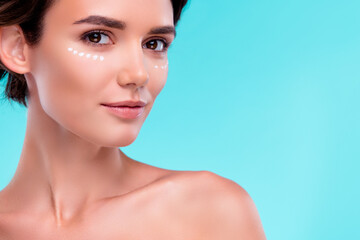 Fototapeta premium Photo of pretty lovely lady enjoy purity perfection after applying gel cream over cyan color background