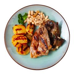 Delicious appetizing fried lamb ribs with boiled potatoes and beans. Isolated over white background