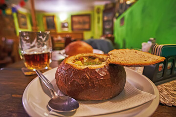 A soup in bread bowl, Prague, Czechia - obrazy, fototapety, plakaty