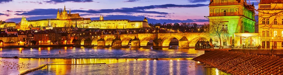  Twilight panorama of Vltava and Prague landmarks, Czechia © efesenko