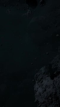 Asteroid belt field in dark outer space. 3D animation wide pan shot. Rock formations of cosmic debris and giant Meteorites. Celestial objects on starry stars background with dust nebula haze low light