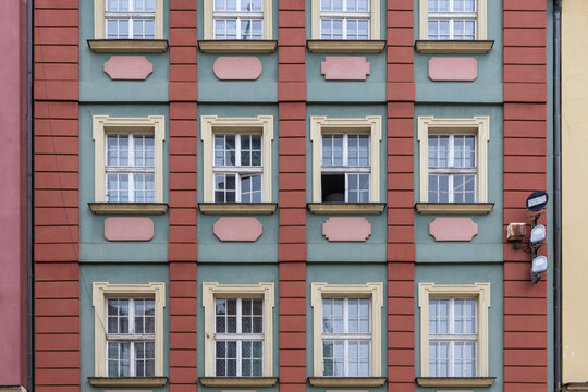 Windows of an old building in Paris, France. Architectural background