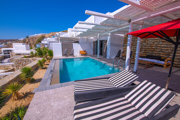 Fototapeta na wymiar Villa with swimming pool in Mykonos town