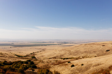 Beautiful autumn landscape with meadows and a road from a bird's eye view. Nature in Oregon in fall. Panorama. Pendleton, Oregon, USA