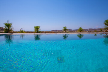 Infinity swimming pool in the villa , Mykonos, Greece