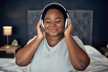 Crying, smile and black woman with headphones for music, sound or audio. Tears, radio and plus size...