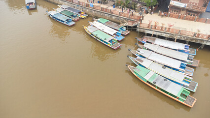 Banjarmasin's Siring river area which is filled with rental engine boats used for Banjarmasin river...