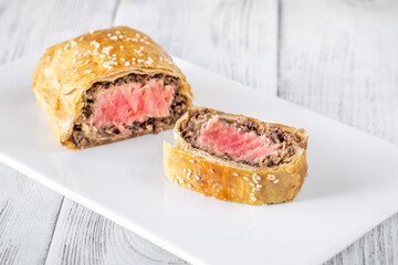 Portion of tuna wellington