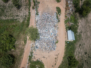 Aerial view of the garbage field (or Landfield) in rural Thailand. It provides a specific place for the disposal of garbage.