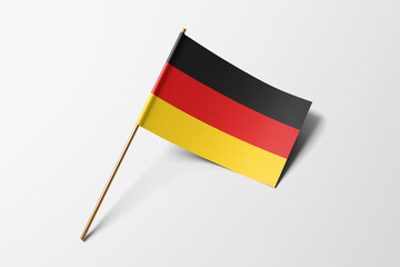 Germany flag of small paper, isolated on white background