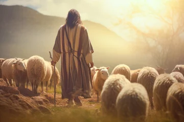 Fotobehang Jesus the good shepherd, guiding his sheep. A christian concept © MVProductions
