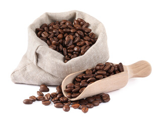 Bag and wooden scoop with roasted coffee beans isolated on white