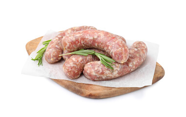 Wooden board with raw homemade sausages and rosemary isolated on white